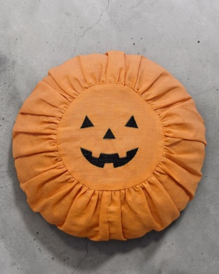Poduszka lniana okrągła, dynia Halloween