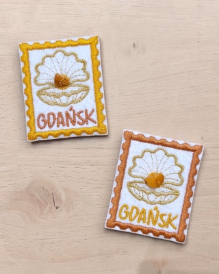 Magnes Gdańsk z bursztynem